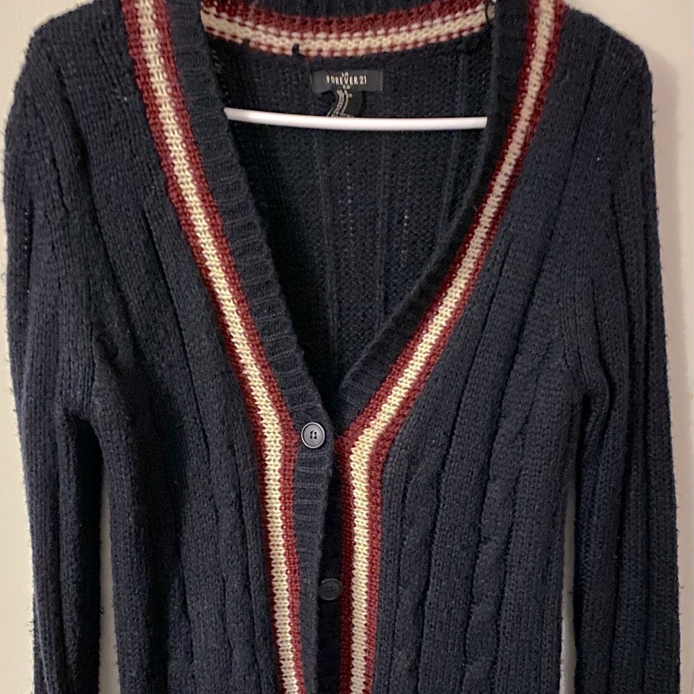 Navy blue, white, and red long cardigan